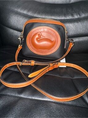 NEW with tags Dooney and Bourke Heritage Domed Crossbody Black and Tan
